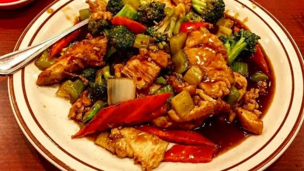 Triple Delight Chinese Food: What It Is, Ingredients, Calories & Easy Recipe 18 Triple Delight Chinese food with chicken, beef, shrimp, and vegetables in savory brown sauce
