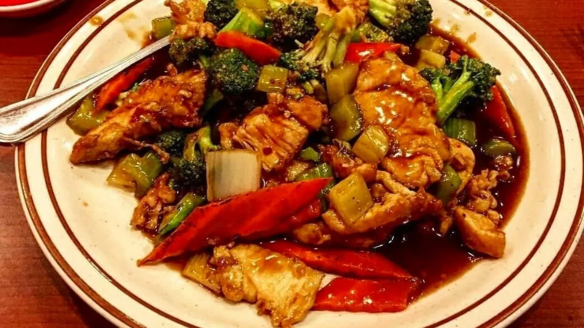 Triple Delight Chinese Food: What It Is, Ingredients, Calories & Easy Recipe 2 Triple Delight Chinese food with chicken, beef, shrimp, and vegetables in savory brown sauce