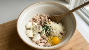 Can Chicken Pizza Crust Recipe: The Viral Low-Carb Pizza Americans Are Loving 4 Mixing canned chicken, cheese, egg, and seasonings for low carb chicken pizza crust