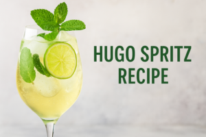 Hugo Spritz Recipe: The Refreshing Italian Cocktail Taking Over Summer 2025 3 Classic hugo spritz recipe garnished with fresh mint leaves and lime slices in a wine glass