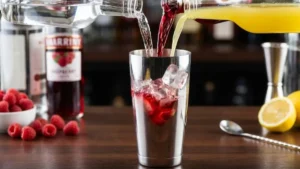 Raspberry Lemon Drop Cocktail Recipe – Bright, Boozy & Ready in Minutes 5 Vodka, raspberry liqueur, and fresh lemon juice added to a cocktail shaker