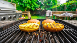 Toasting burger buns on grill for cookout burgers